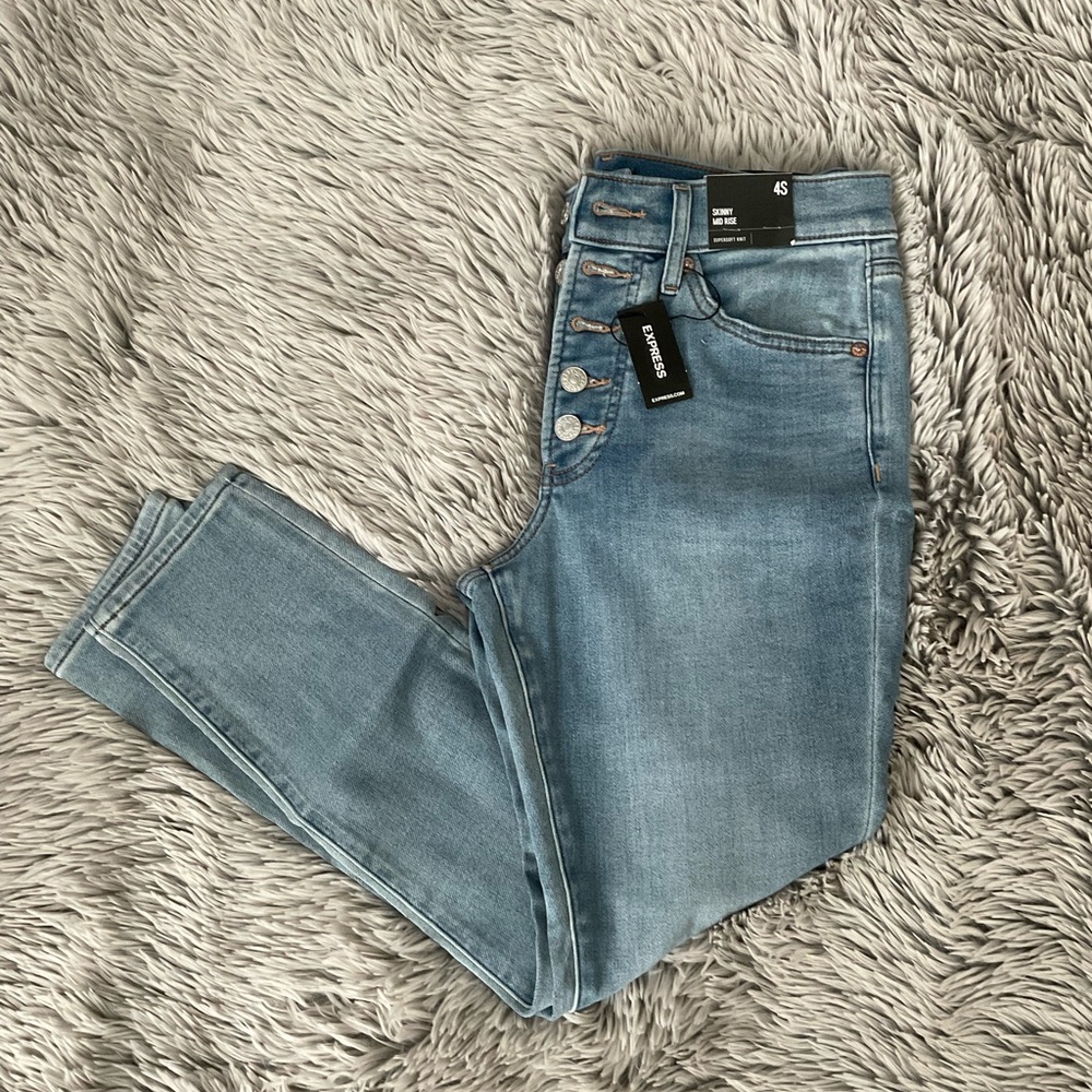 TAKE 40% OFF - Express Skinny Midrise Jeans